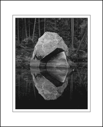 "Dipper Rock" Merced River, Yosemite Valley
© 2002 John D. Clark
All Rights Reserved
In 1962, Ansel Adams photographed this same large granite boulder. At that time, there were large fractures visible in the rock mass, but the boulder was still whole. 40 years later, large chunks of rock had fallen away, leaving this beautiful rock sculpture reflected in the river. The earlier photo can be found in the 1979 Ansel Adams book "Yosemite and the Range of Light" (photo #33, "Rock, Merced River, Autumn, Yosemite Valley").